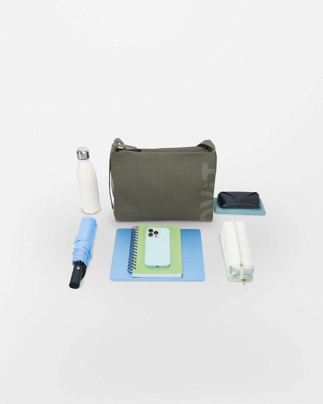 laptop · tablet · notebook · water bottle · phone · wallet · pouch
