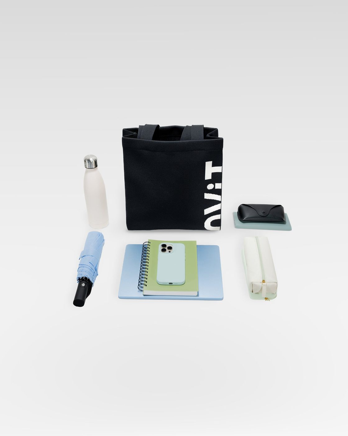 laptop · tablet · notebook · water bottle · phone · wallet · pouch